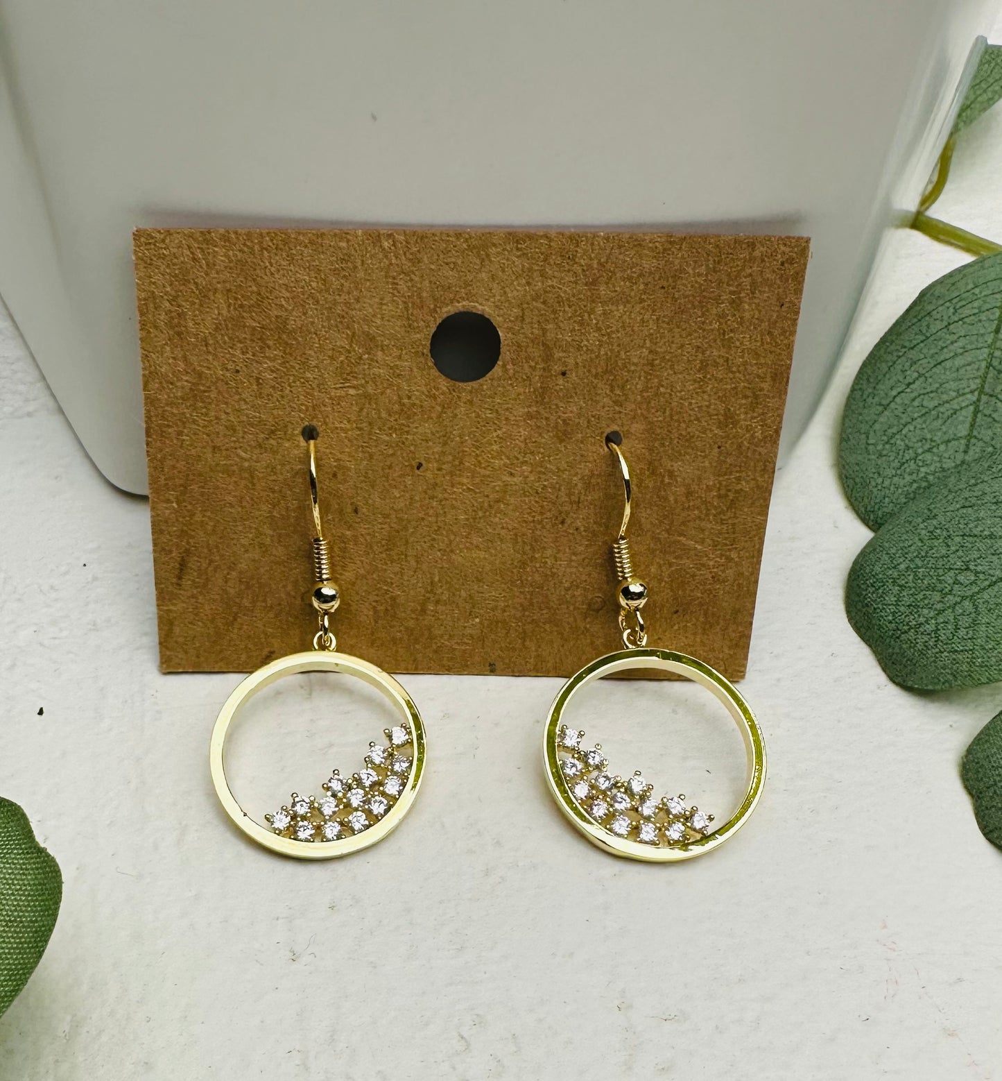Circle filled with rhinestones hook earrings